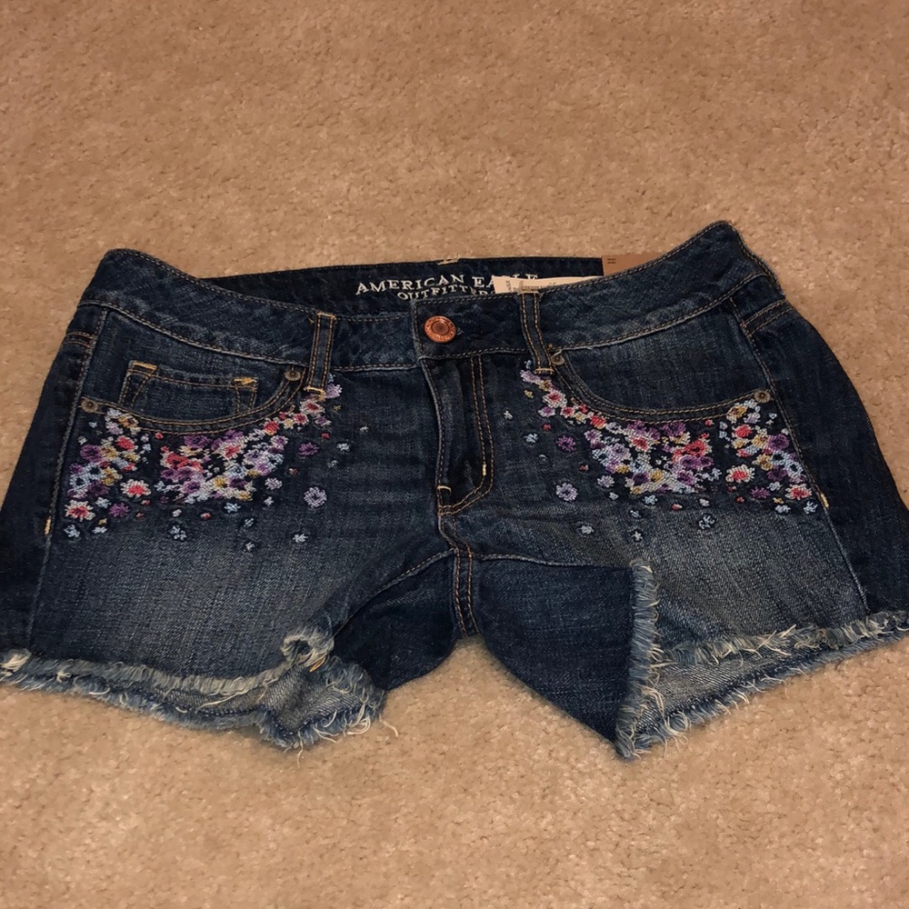 jean shorts with floral stitching